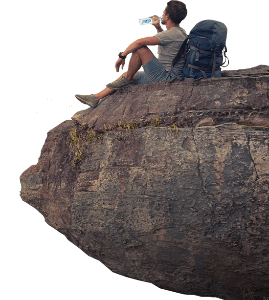 Male Hiker Drinking Alkaline Water from Hydrates Water Bottle